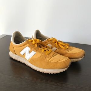 Bright yellow New Balances